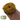 Marigold Forage Donut, held in hand to show size.